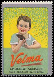 Junge mit Velma Schokolade