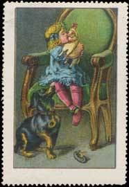 Kind mit Puppe und Hund
